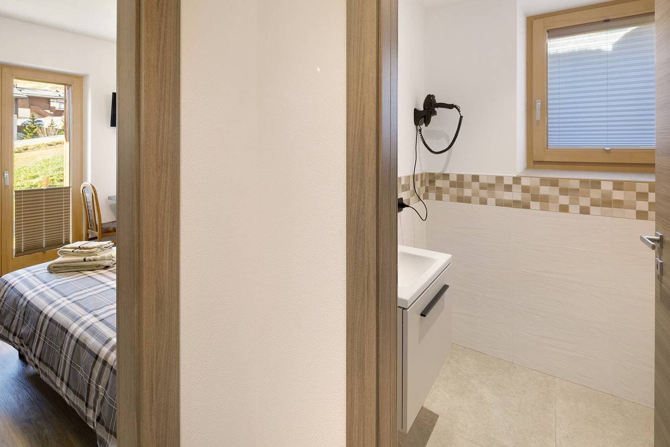 Foto 10 von 14: Ferienwohnung 'Gino' mit Bergblick, privatem Garten und WLAN