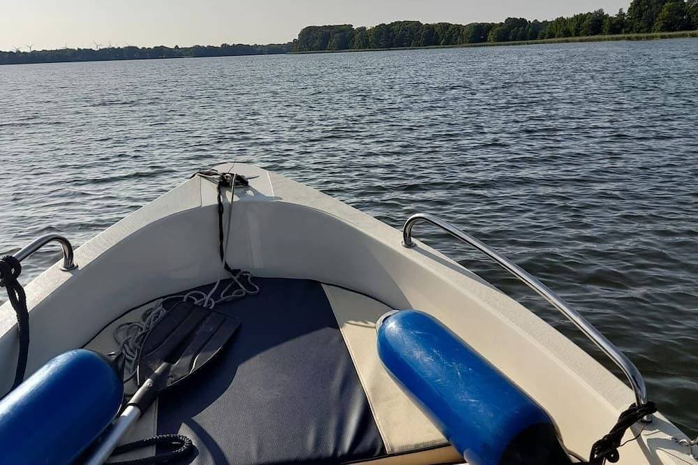 Foto 6 von 9: Top Lage am See - Charmantes Gelbes Bungalow mit Terrasse & Seeblick