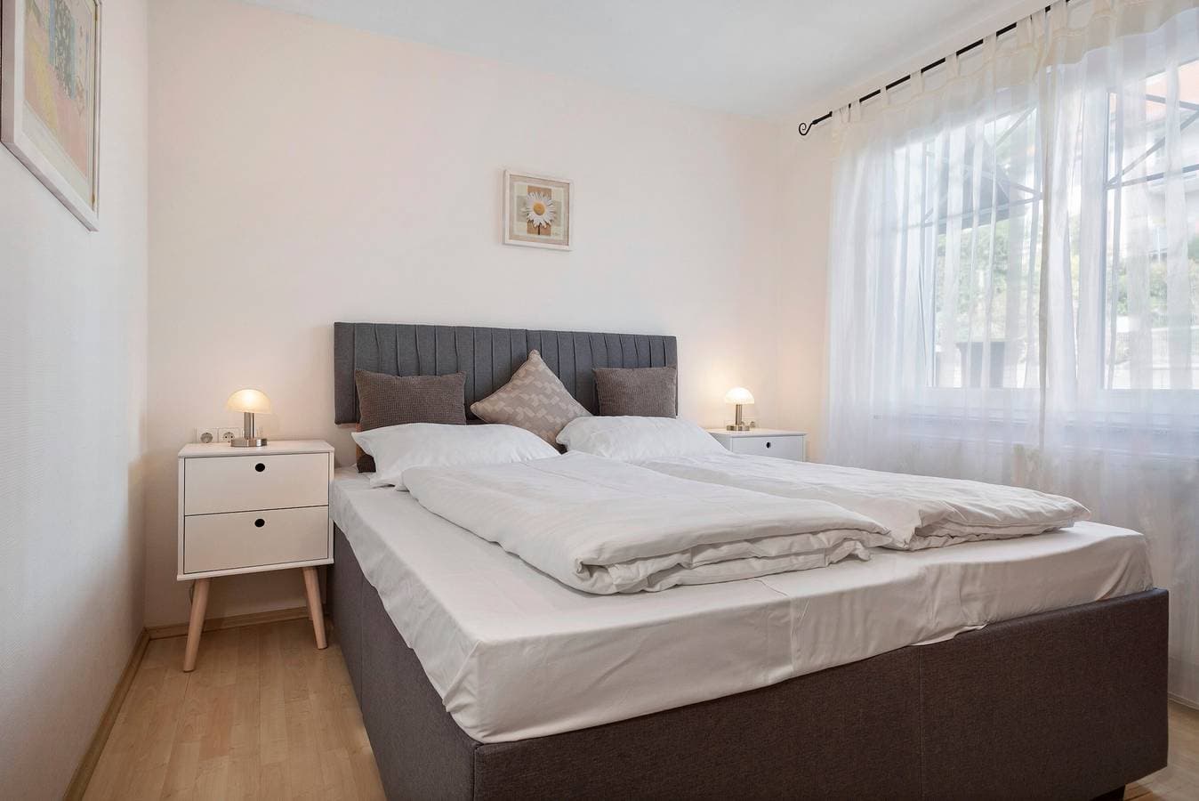 Foto 10 von 21: Ferienwohnung 'Jacqueline' mit privater Terrasse, Gemeinschaftsgarten und Wi-Fi
