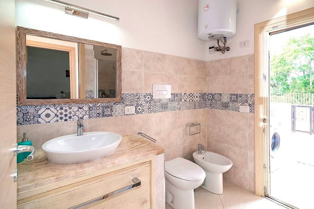 Foto 7 von 25: Apartment 'Mediterranean Sea Shell Pool House' – Modernes Apartment am Pool in Budoni
