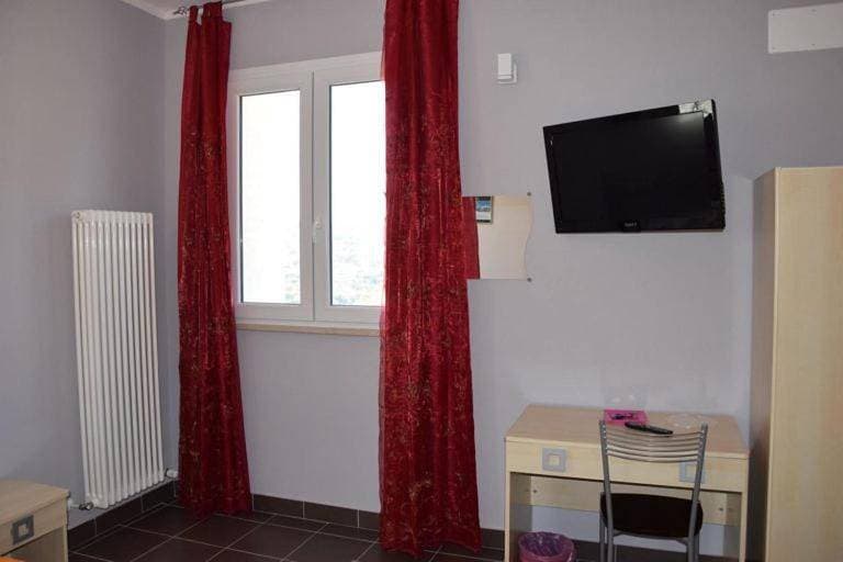 Foto 7 von 7: Quadruple Room with Private Bathroom