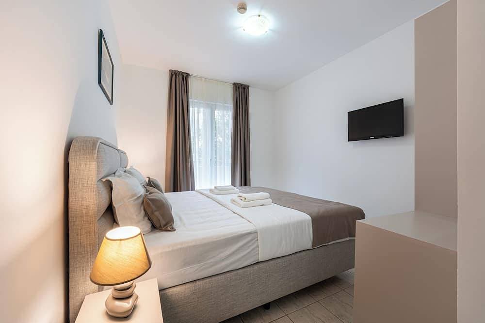 Foto 8 von 12: Cozy Double Room near the Beach