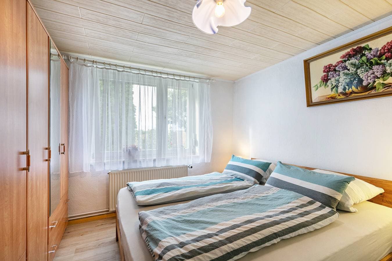Foto 10 von 27: Ferienwohnung 'Im Blumengarten' mit WLAN, Terrasse & Garten