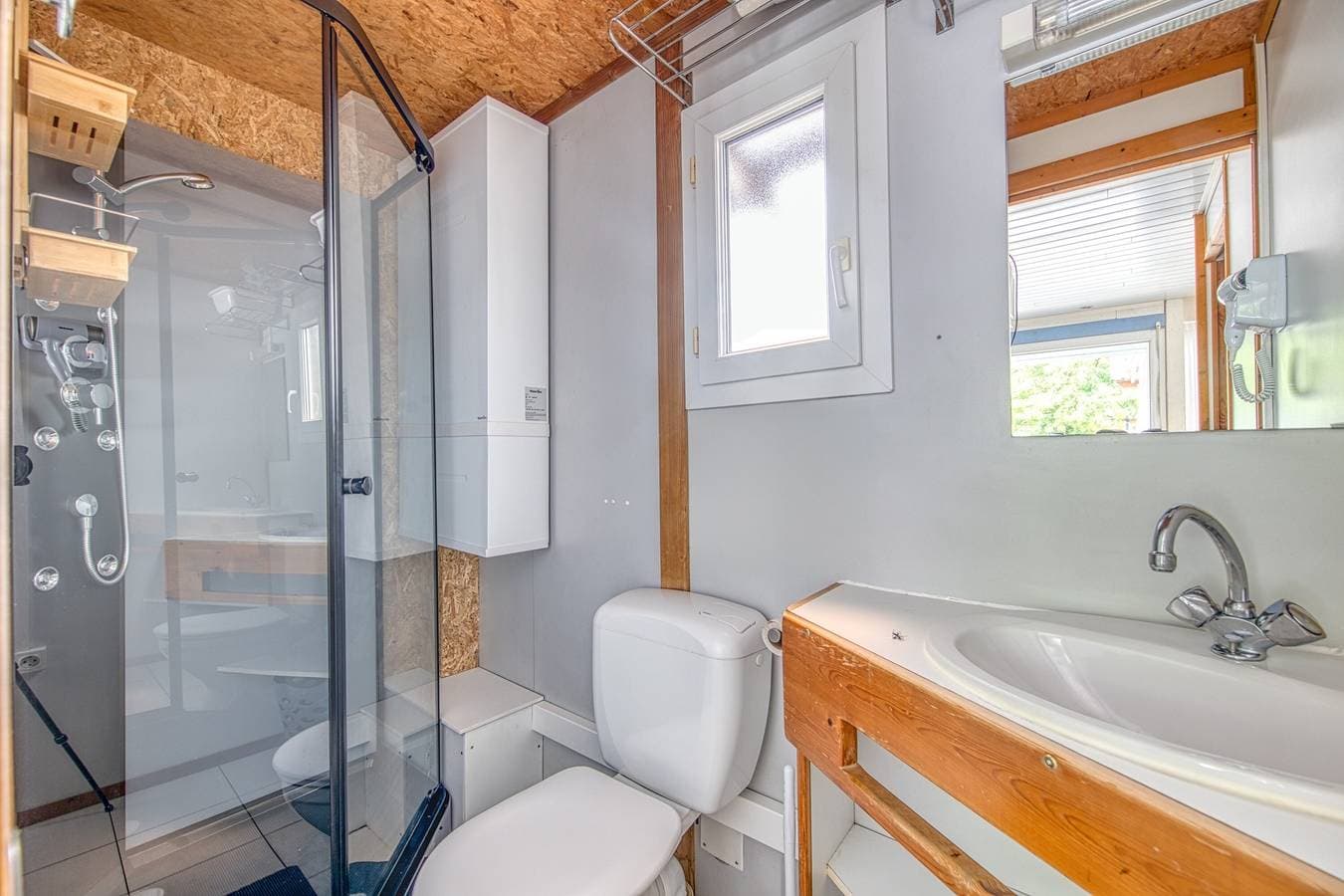 Foto 9 von 33: Ferienwohnung 'Chalet B Village Vacances' mit Gemeinschaftspool, privater Terrasse und WLAN