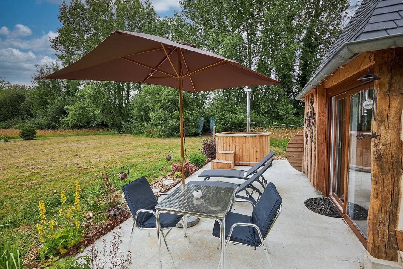 Foto 4 von 10: Kleine Unterkunft „Le chouette insolite“ mit privatem Garten und nordischem Bad