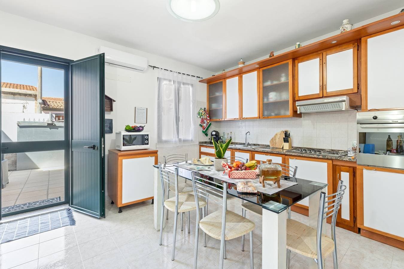 Foto 5 von 31: Ferienhaus 'Marcello' mit Bergblick, Privater Terrasse und Klimaanlage