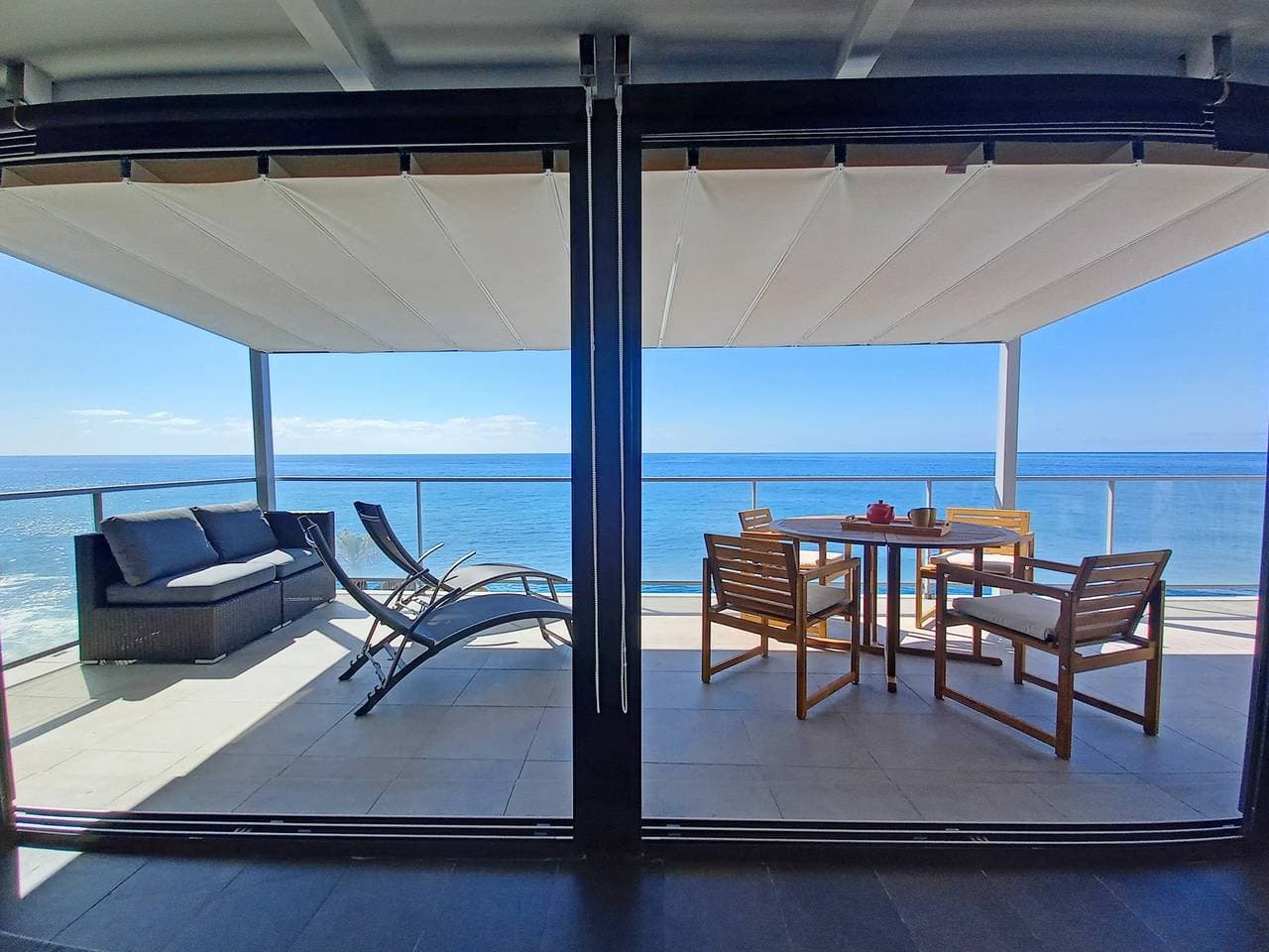 Foto 5 von 25: Ferienwohnung 'The Wave House - Seaside Haven' mit Meerblick, Wi-Fi und Klimaanlage