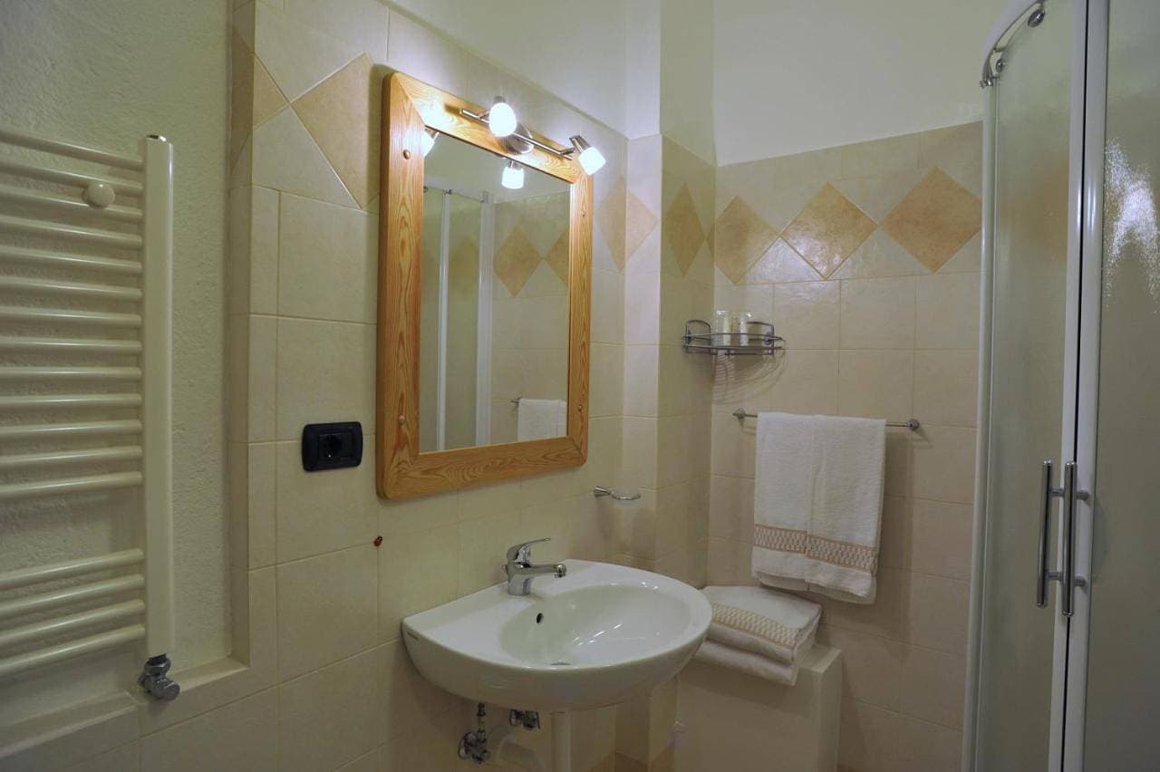 Foto 10 von 11: Quadruple Room