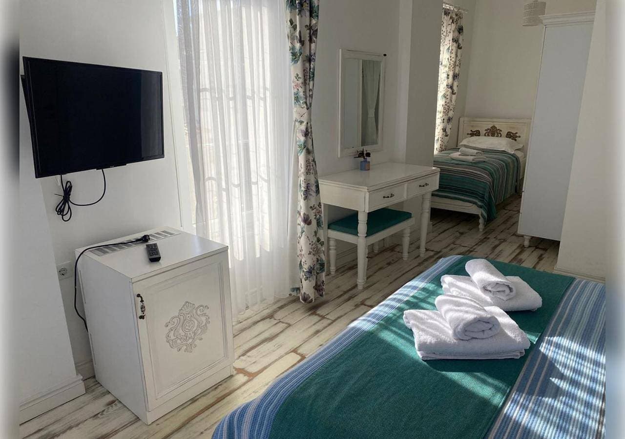 Foto 7 von 10: Deluxe Triple Room with Sea View
