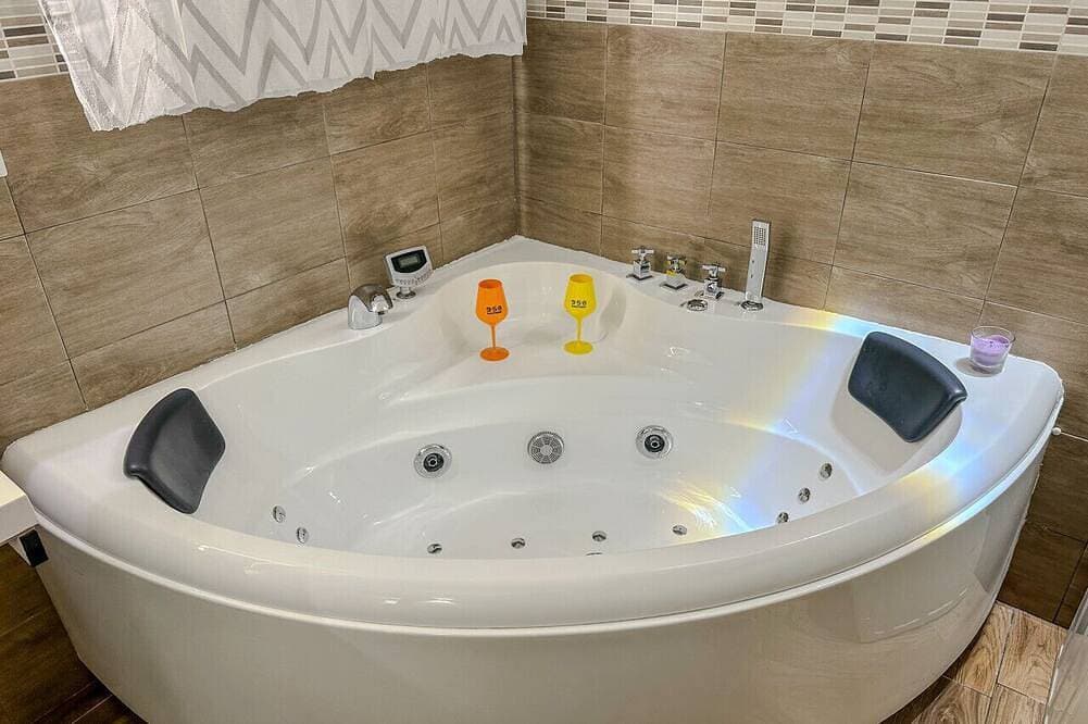 Foto 8 von 20: Appartamento Romano - Jacuzzi