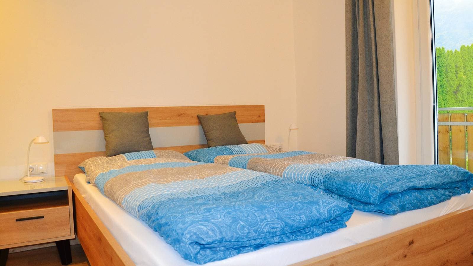 Foto 4 von 28: Ferienwohnung 'Residenz Sonnegg 4' mit Bergblick, Gemeinschaftspool und WLAN