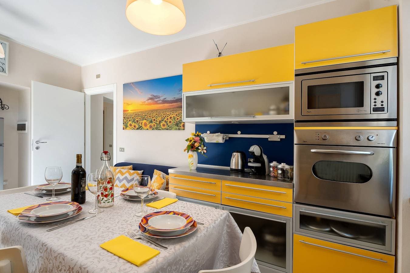 Foto 9 von 26: Ferienwohnung 'Res Jasmine- Appartamento Yellow' mit Bergblick, Gemeinschaftsgarten und Wi-Fi
