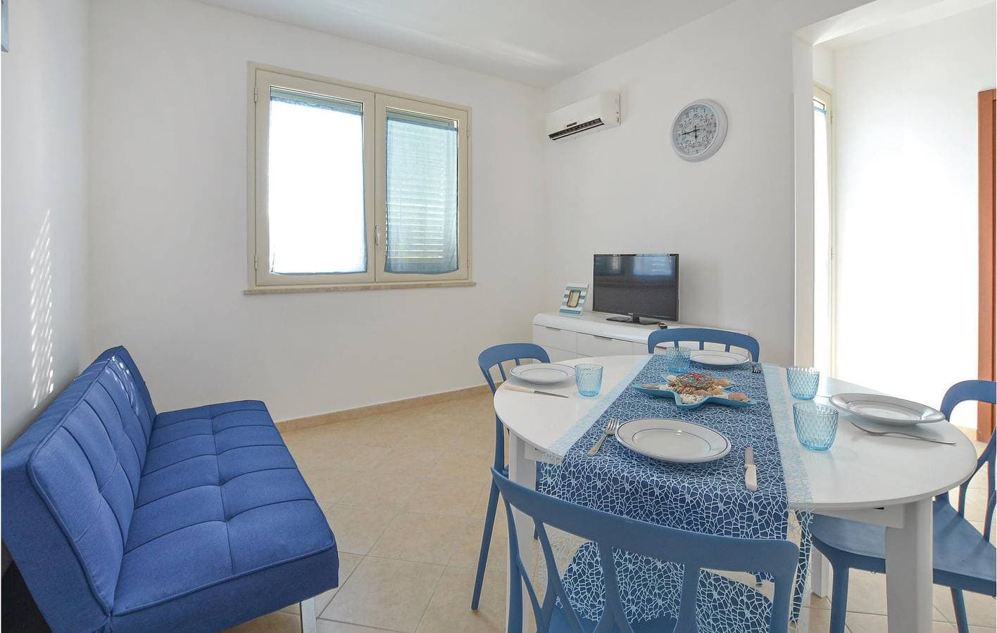 Foto 11 von 16: Appartement am Strand: AC, Parkplatz, Terrasse