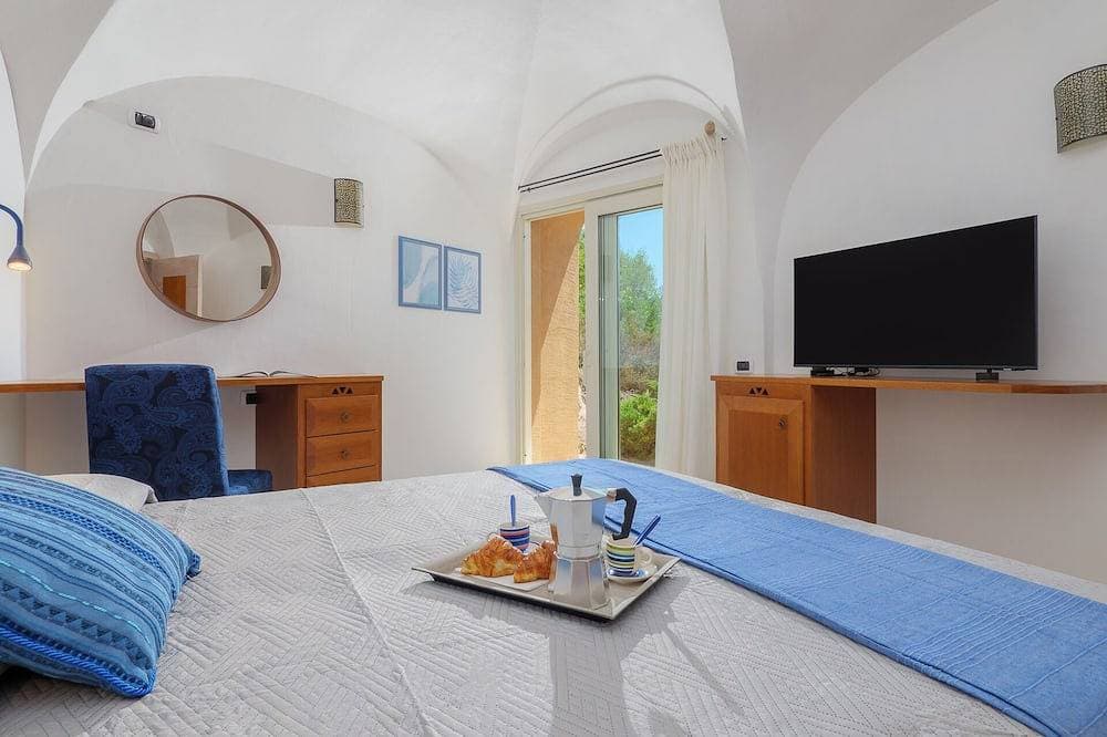 Foto 6 von 30: Azzurra apartment with pool access - Villaggio Sherden Golfo Aranci