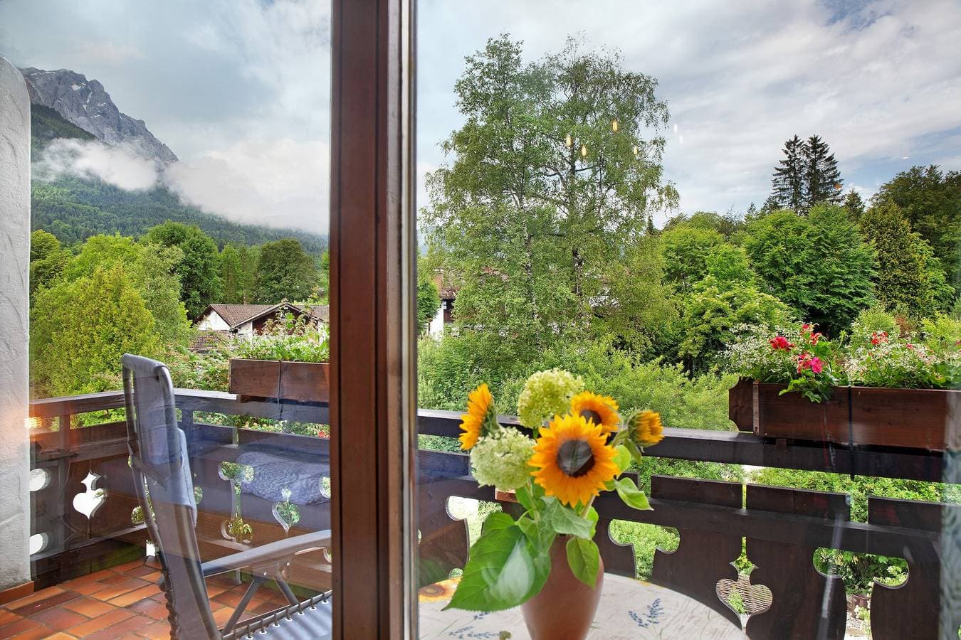Foto 12 von 33: Studio-Apartment 'Aschaubichl – Enzian' mit Bergblick, Balkon und WLAN