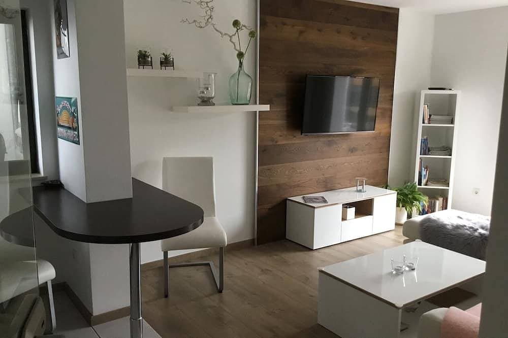 Moderne sonnige Ferienwohnung - ruhige Lage, mit großer Terrasse 1