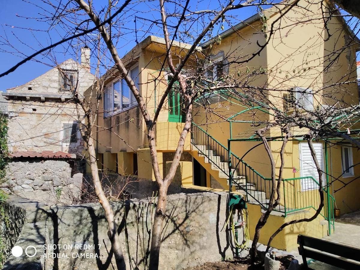 Apartments by the sea Krapanj, Sibenik - 18180 1