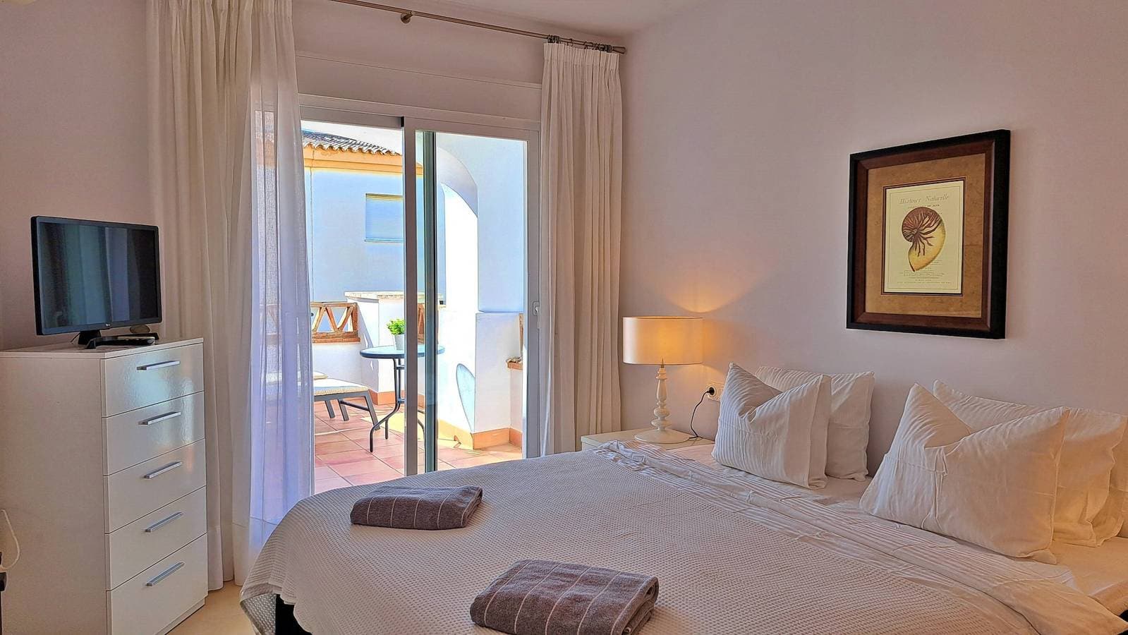 Foto 12 von 33: Apartment 'Baviera Golf' mit Meerblick, WLAN und Klimaanlage