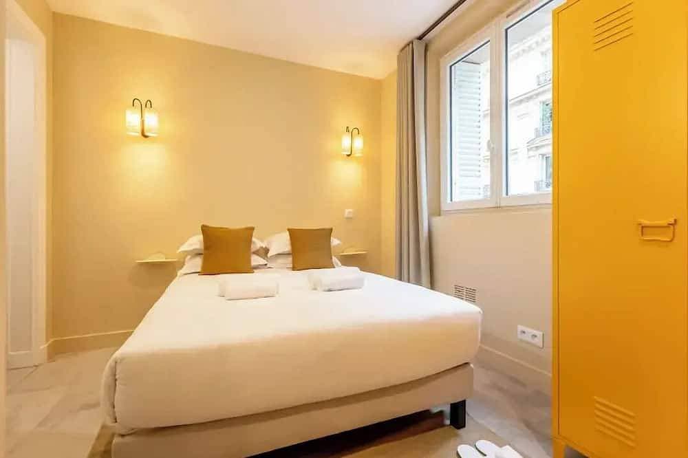 Foto 4 von 16: Stylish City Lights Escape – 2-Bedroom Gem In Central Paris