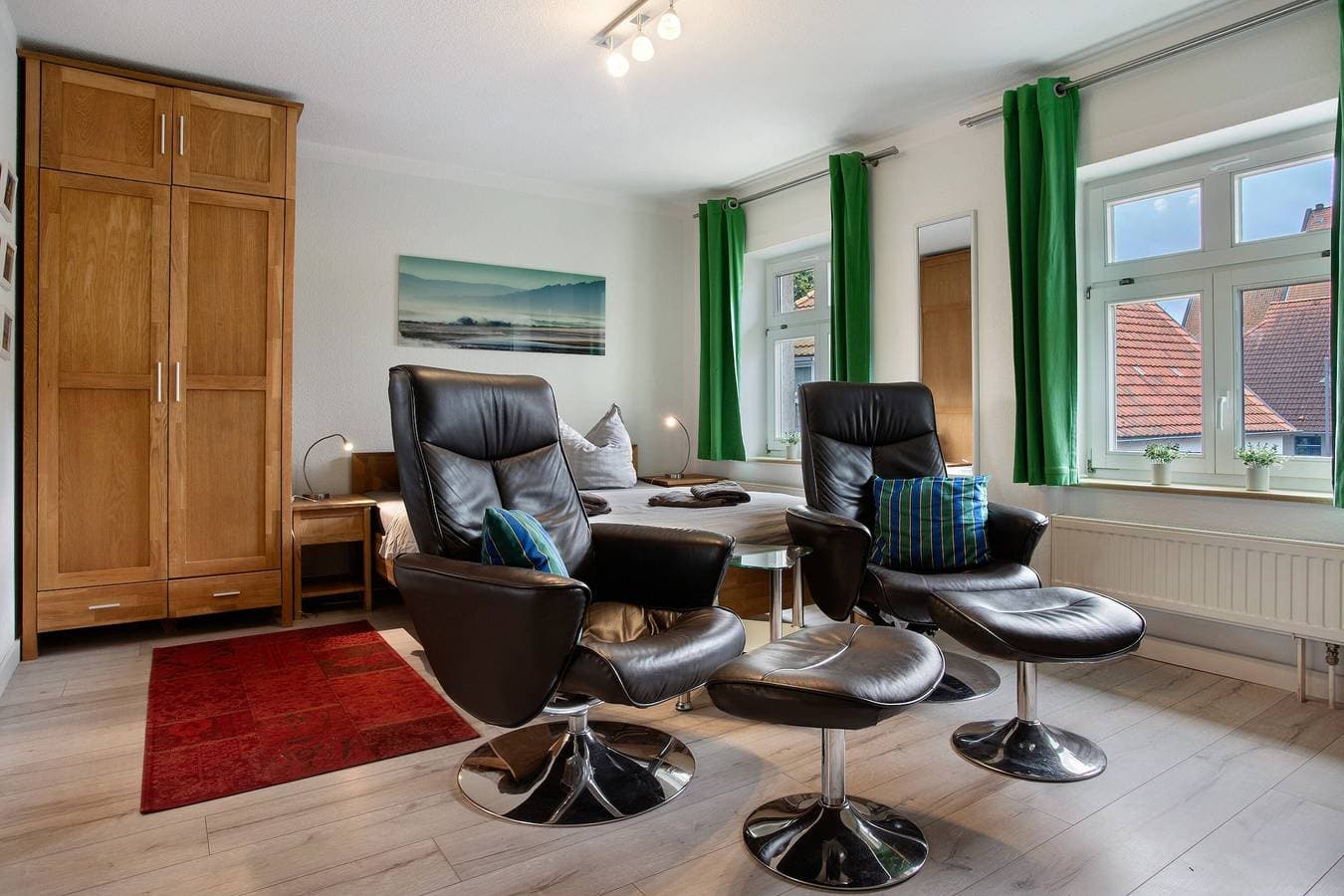 Foto 4 von 19: Einzimmerapartment 'Bäckerhus - Ferienwohnung 3' mit Gemeinschaftsterrasse und Garten