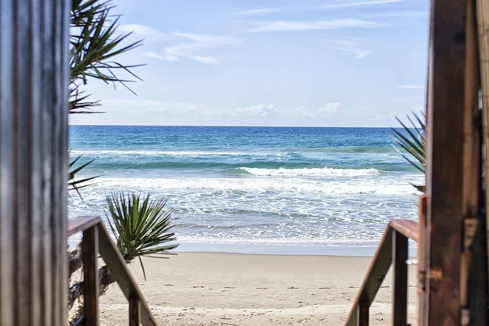 Haus mit Garten mit Blick auf den Strand 1