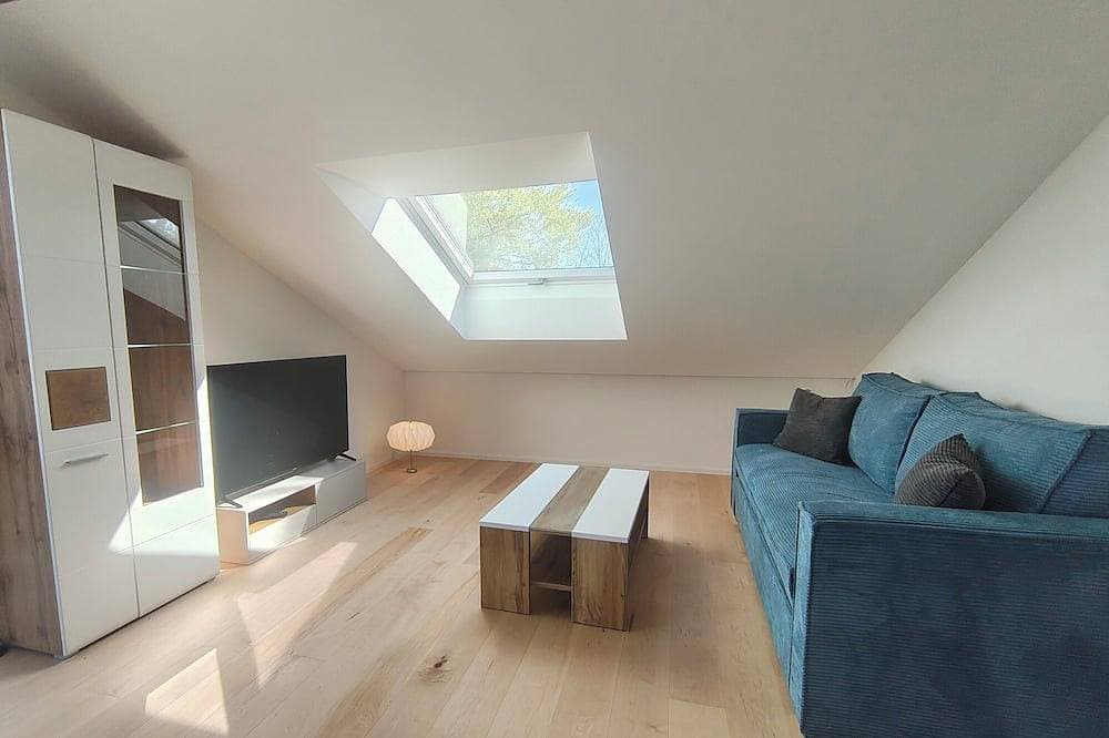Foto 13 von 21: Gemütliche 3 Zimmer Ferienwohnung mit eigener  Terasse, Berg- und Seeblick