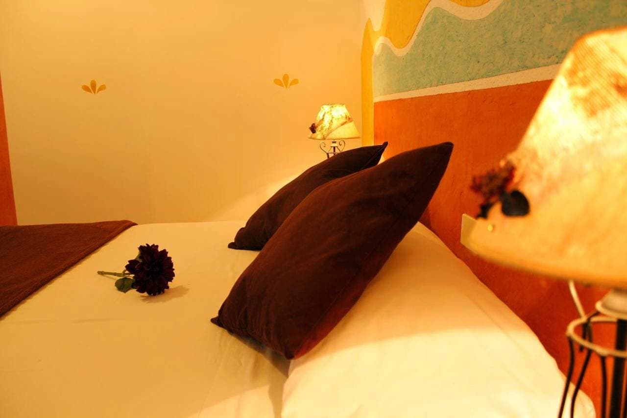Foto 2 von 14: Triple Room