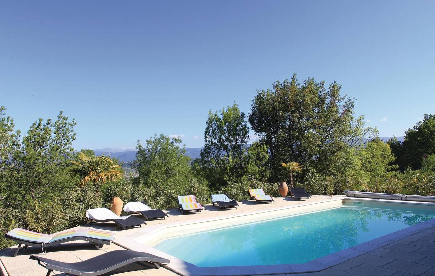 Foto 9 von 18: Apartment mit Bergblick, Parkplatz, Pool und WiFi