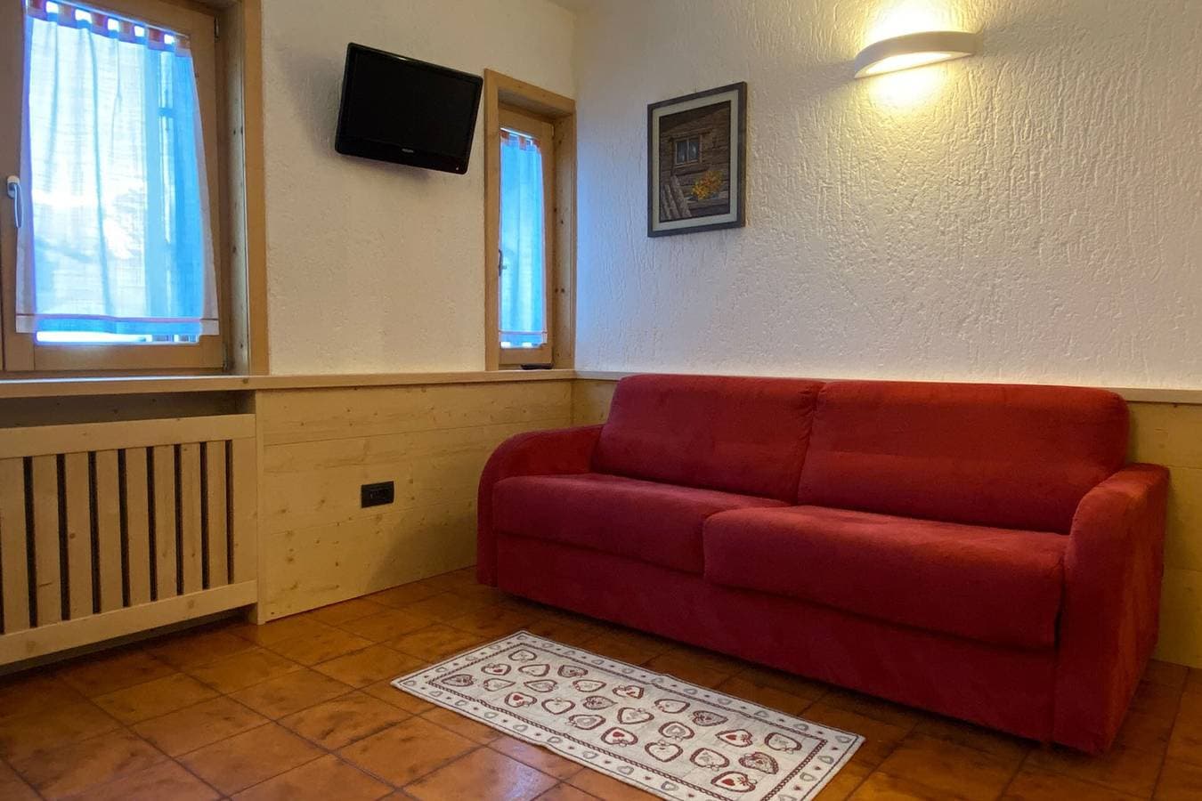 Foto 7 von 21: Ferienwohnung 'Residenz Attila Giardino' mit Bergblick, Gemeinschaftsgarten & WLAN