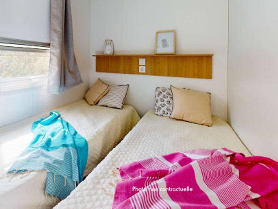 Foto 13 von 59: Camping Siblu les Embruns Funpass inclus - Mobilheim 8 personen - Essential 3ch 8p Signature clim