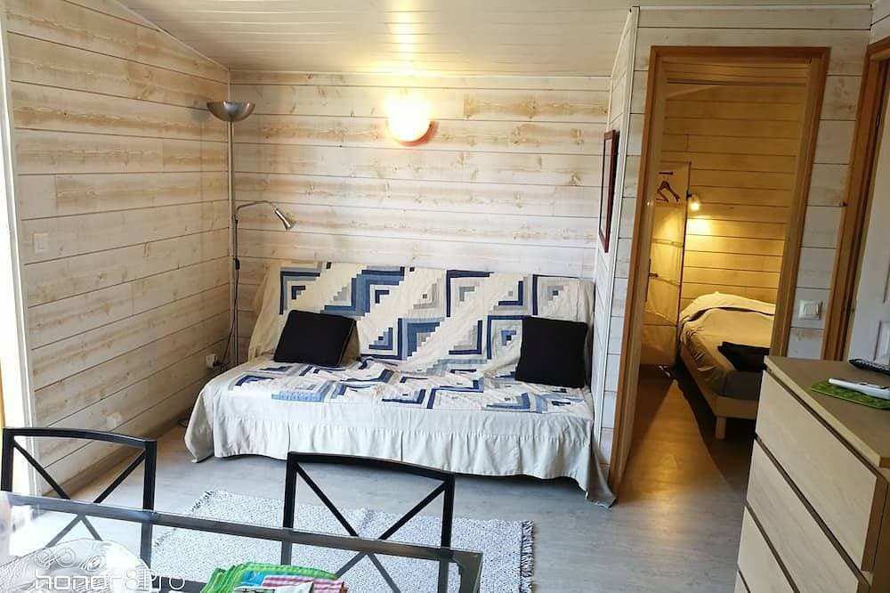 Foto 3 von 8: Two chalets (+40 m2) separated by a small patio 200m from the beach