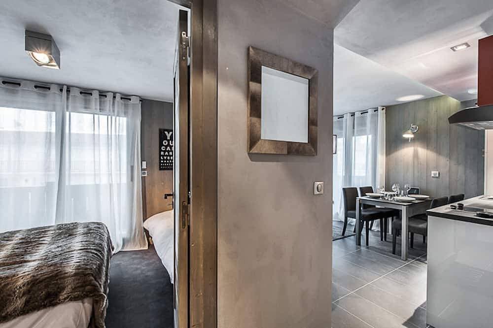 Foto 3 von 14: Gemütliche Wohnung in Courchevel mit großem Schlafzimmer und Parkplatz
