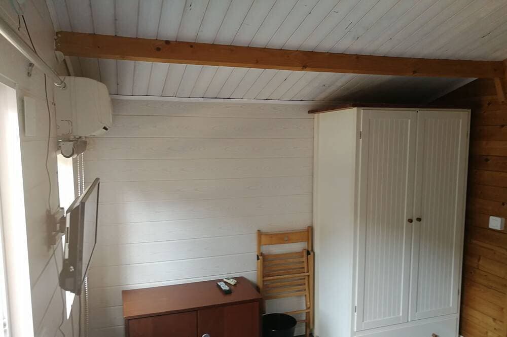 Foto 6 von 8: Two chalets (+40 m2) separated by a small patio 200m from the beach