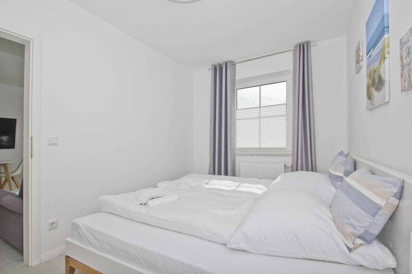 Foto 12 von 18: Modernen Ferienwohnung mit eigener Terrasse - Haus Inselwind FeWo MEERküste