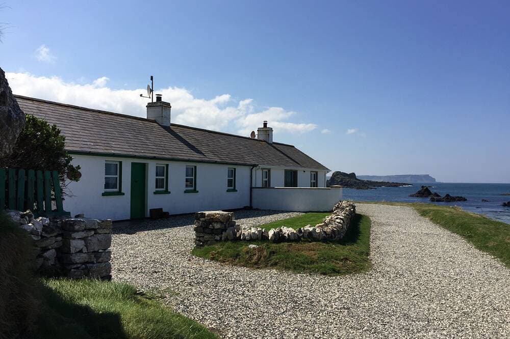 Foto 8 von 30: Schönes Ferienhaus direkt am Meer, weitläufige private Gärten, atemberaubender Meerblick.