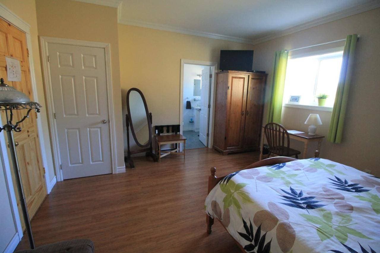 Foto 4 von 11: Triple Room with Garden View