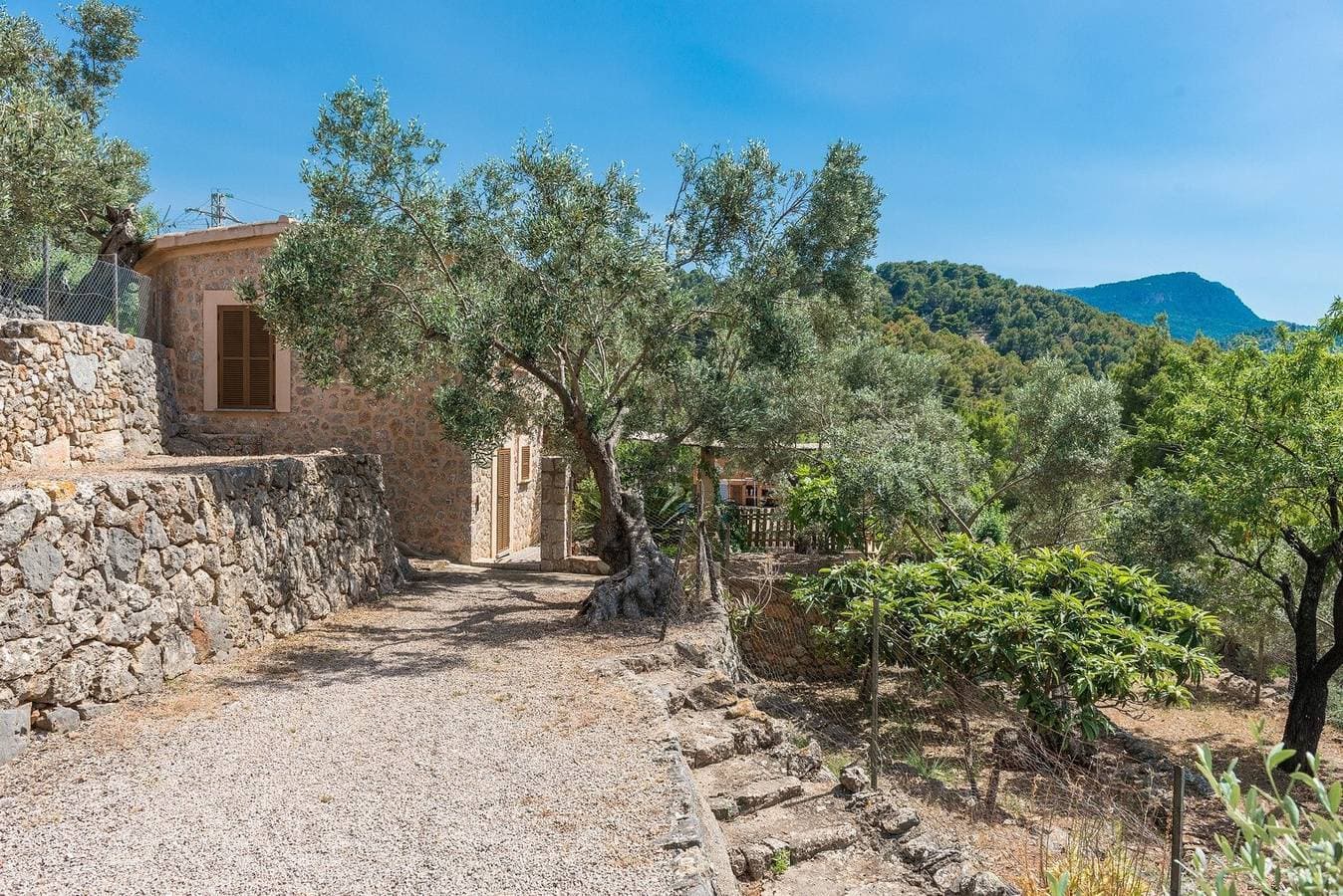 Foto 7 von 18: Casa „Can Tamany“ mit Bergblick, Gemeinschaftspool, Garten und WLAN