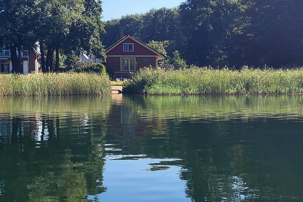 Ferienhaus mit Seezugang, Steg, Ruderboot, Fasssauna und Wallbox 1