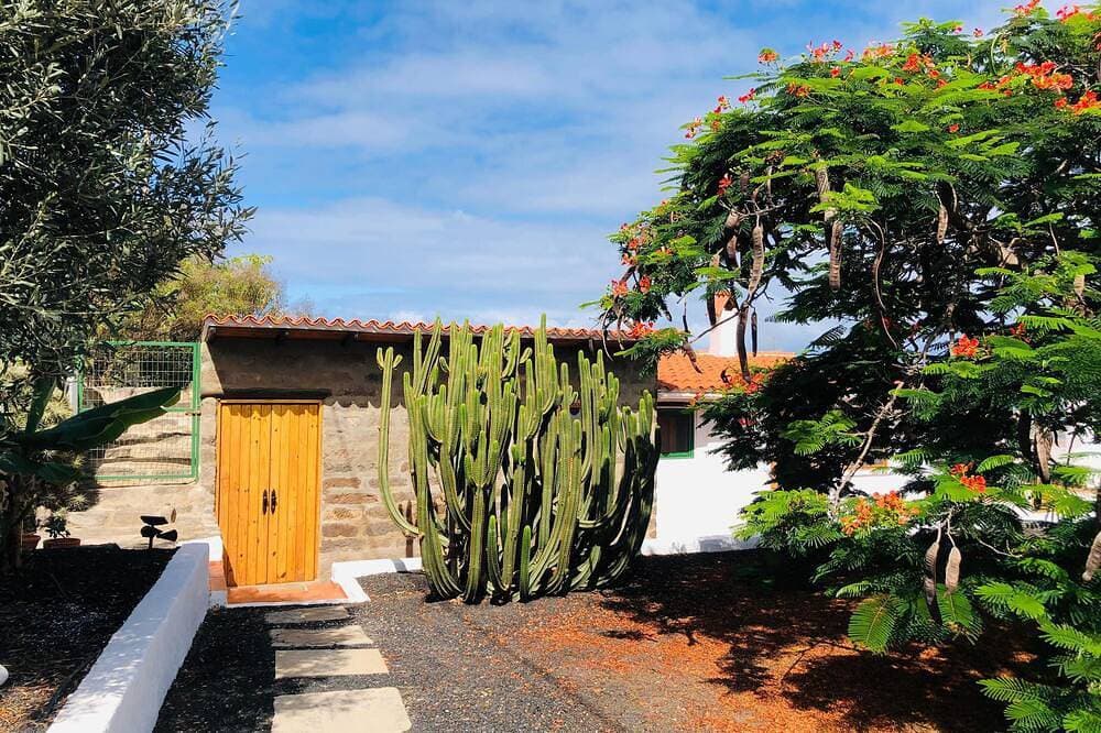 Foto 10 von 21: Cabaña en zona tranquila con bonitas vistas, acogedor estilo y cuidado jardín.