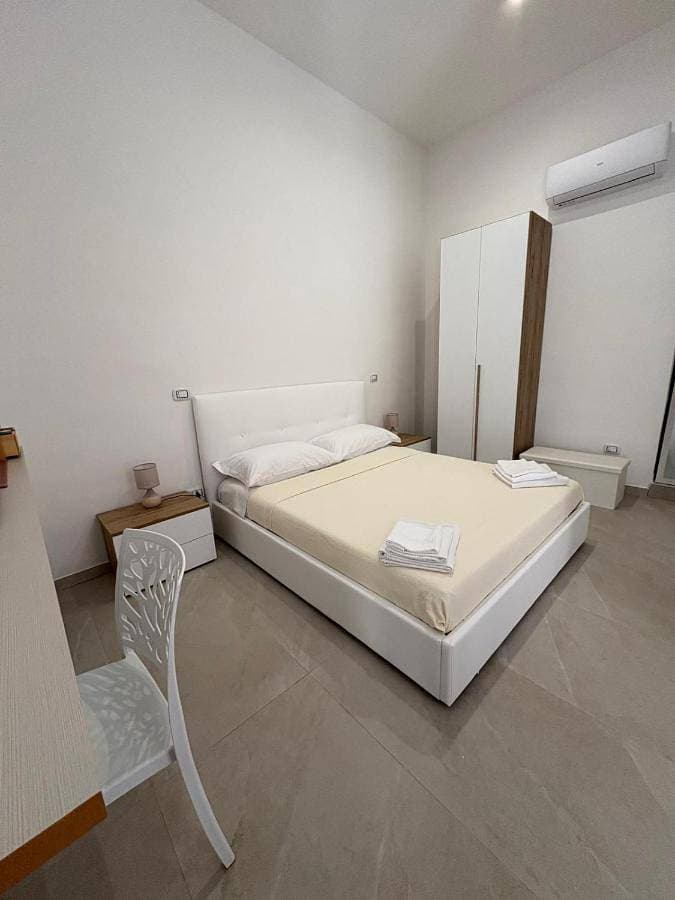 Foto 4 von 5: Triple Room with Private Bathroom