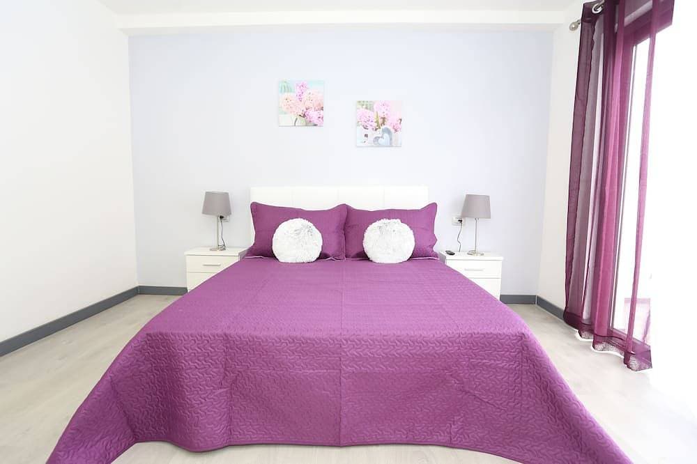 Foto 4 von 30: Einzelhaus mit 3 Schlafzimmern, 3 Bädern, Wohnzimmer, Küche, Garten
