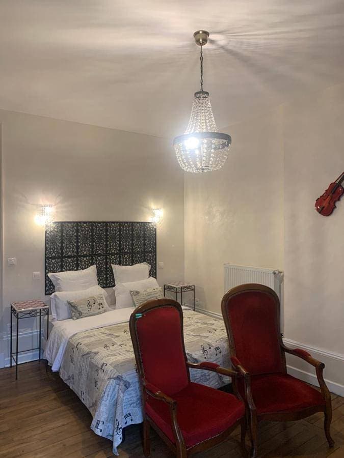 Foto 4 von 7: Triple Room with Private Bathroom
