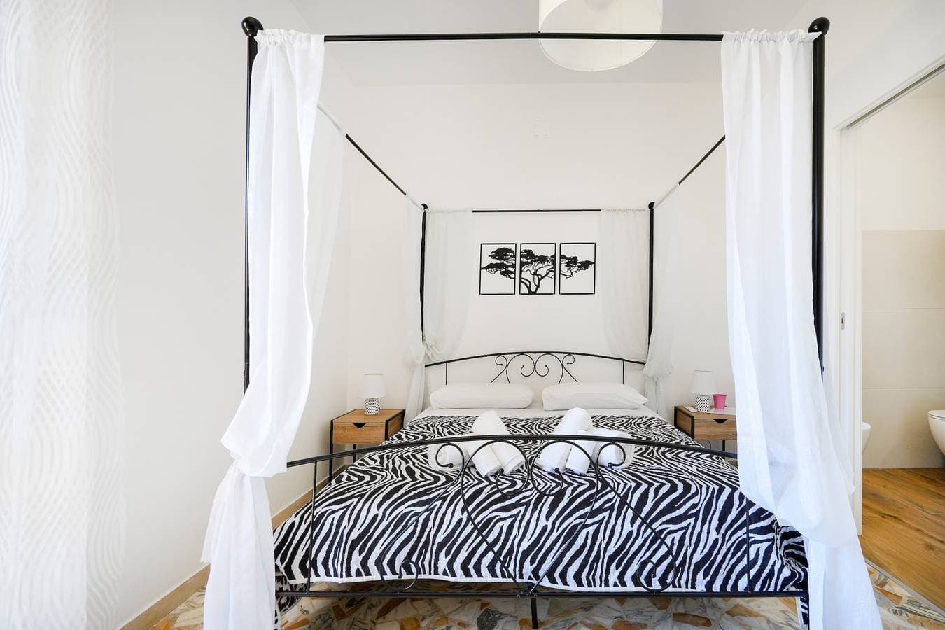 Foto 6 von 22: Zimmer 'Casa Merlino - Matrimoniale' mit Balkon, WLAN und Klimaanlage