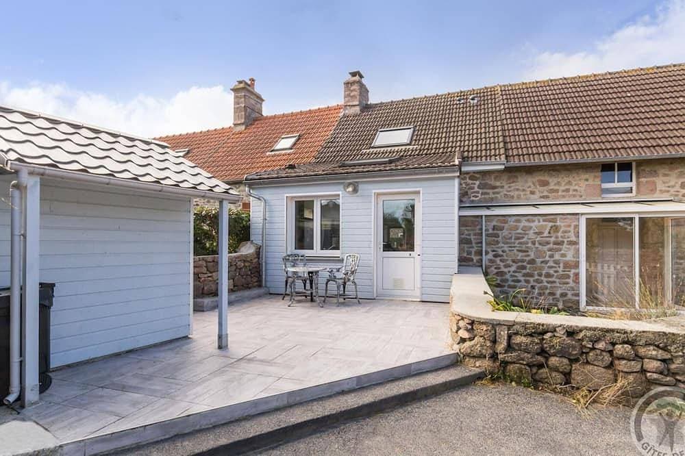 Foto 11 von 21: Gemütliche Küstenhäuschen mit Terrasse, Garten und Meerblick, ideal für Erholung und Entspannung