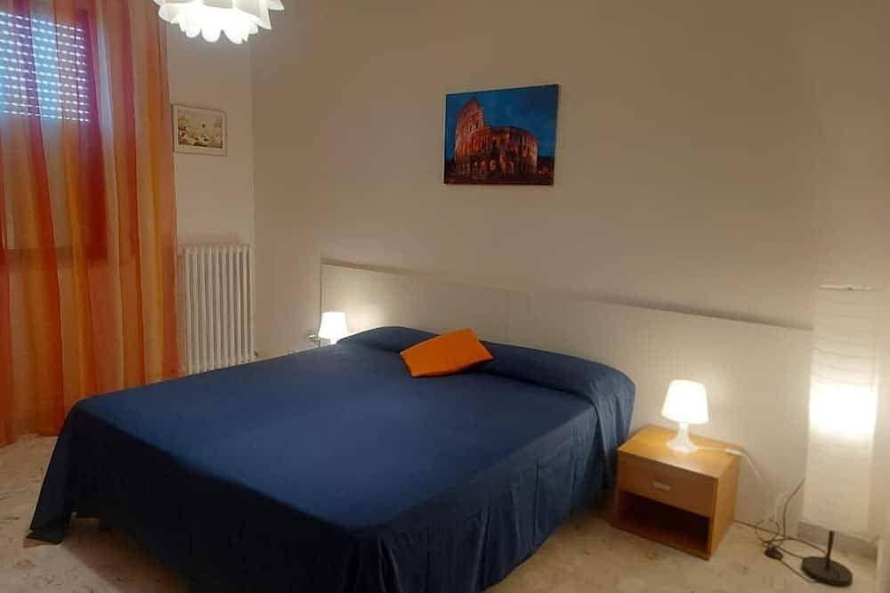 Foto 2 von 21: Accogliente Appartamento per Famiglie al Centro