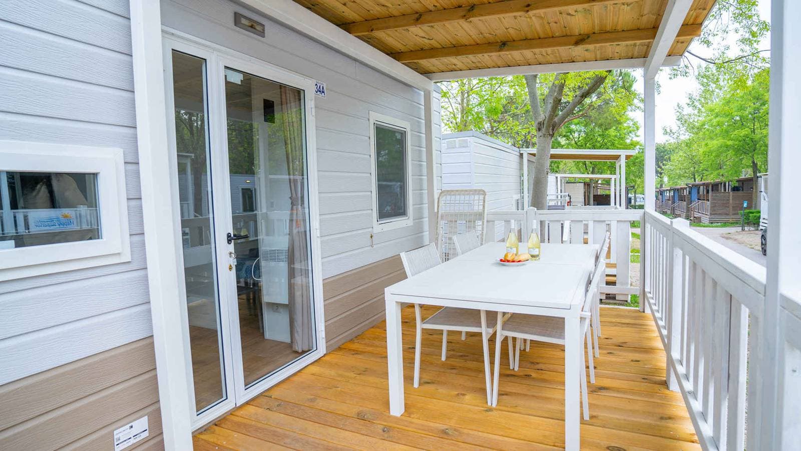Foto 3 von 31: Mobilehome mit Klimaanlage, Terrasse und Pool