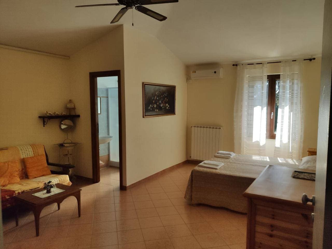Foto 8 von 19: Quadruple Room with Garden View