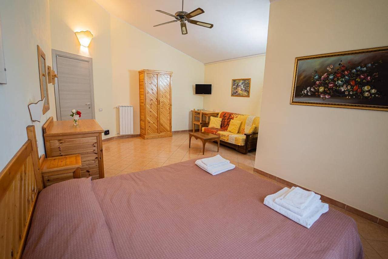 Foto 12 von 19: Quadruple Room with Garden View