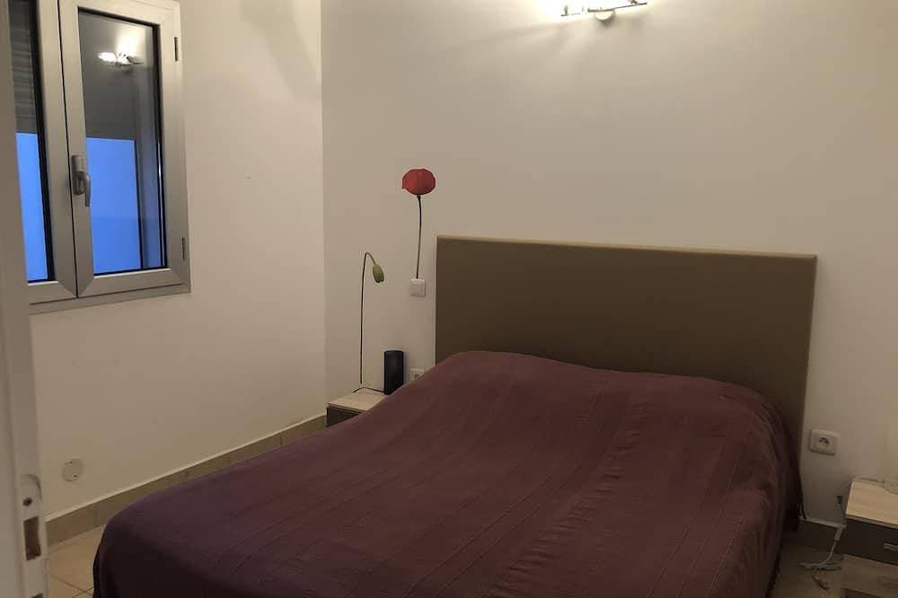 Foto 2 von 13: Stella Marina Apartment mit Blick auf Hafen und Strand, Swimmingpool.
