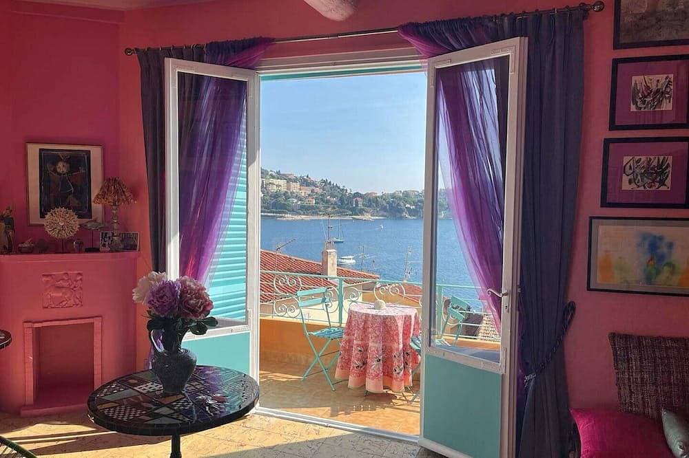 26. A colorful apartment with a beautiful sea view and a balcony 1